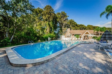 Lovely Highland Lakes villa located in Mission Grove. This villa on Highland Lakes Executive Golf Course in Florida - for sale on GolfHomes.com, golf home, golf lot
