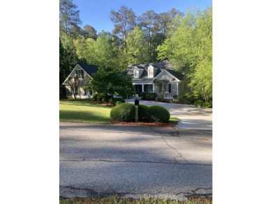 WELCOME TO 1020 TROUBLESOME CREEK LANE. THIS CHARMING LAKE for sale on GolfHomes.com