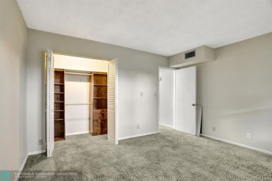 DRAMATICALLY REDUCED, SELLER IS MOTIVATED, Discover this on Wynmoor Golf Course in Florida - for sale on GolfHomes.com, golf home, golf lot
