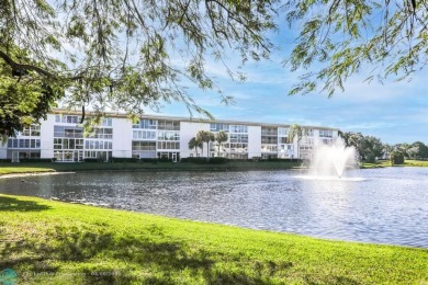DRAMATICALLY REDUCED, SELLER IS MOTIVATED, Discover this on Wynmoor Golf Course in Florida - for sale on GolfHomes.com, golf home, golf lot