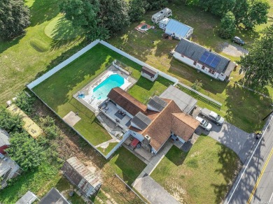 Welcome to this beautifully maintained home on a serene .39-acre on Sunnyside Par 3 Golf Course in New York - for sale on GolfHomes.com, golf home, golf lot