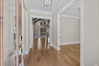 Experience refined living in this golf-front masterpiece by on Harbor Club Golf and Country Club in Georgia - for sale on GolfHomes.com, golf home, golf lot