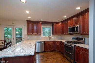 Welcome to this serene and lush property set on nearly an acre on Warrenbrook Golf Course in New Jersey - for sale on GolfHomes.com, golf home, golf lot