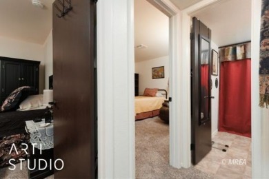 Discover this highly desirable lower-level unit in the Rock on The Oasis Golf Club in Nevada - for sale on GolfHomes.com, golf home, golf lot