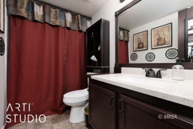 Discover this highly desirable lower-level unit in the Rock on The Oasis Golf Club in Nevada - for sale on GolfHomes.com, golf home, golf lot