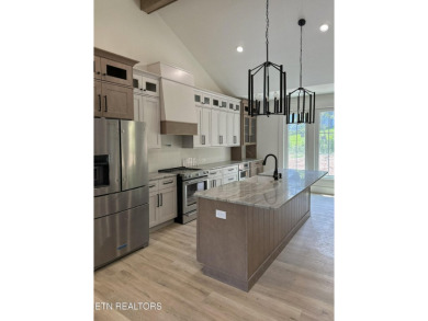 Priced below appraised value and located in the highly desirable on Tanasi Golf Course in Tennessee - for sale on GolfHomes.com, golf home, golf lot