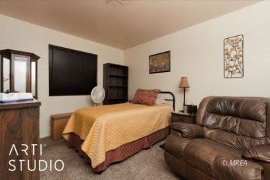 Discover this highly desirable lower-level unit in the Rock on The Oasis Golf Club in Nevada - for sale on GolfHomes.com, golf home, golf lot