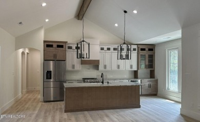 Priced below appraised value and located in the highly desirable on Tanasi Golf Course in Tennessee - for sale on GolfHomes.com, golf home, golf lot