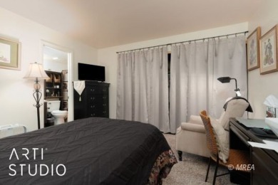 Discover this highly desirable lower-level unit in the Rock on The Oasis Golf Club in Nevada - for sale on GolfHomes.com, golf home, golf lot