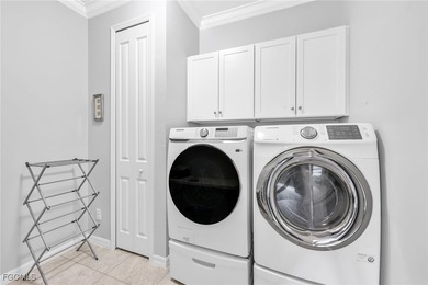 Picture mornings at the breakfast bar, gas flame on, sunlight on Heritage Palms Golf and Country Club in Florida - for sale on GolfHomes.com, golf home, golf lot