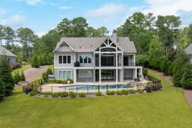 Welcome to this like-new craftsman-style masterpiece, nestled in on Reynolds Lake Oconee - The Oconee in Georgia - for sale on GolfHomes.com, golf home, golf lot