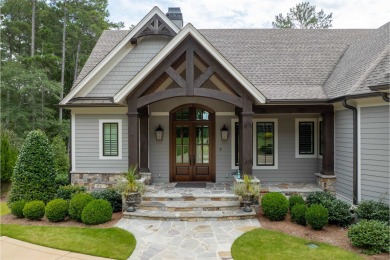 Welcome to this like-new craftsman-style masterpiece, nestled in on Reynolds Lake Oconee - The Oconee in Georgia - for sale on GolfHomes.com, golf home, golf lot