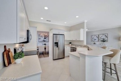 Welcome to this stunning move-in ready first-floor coach home on Royal Poinciana Golf Club in Florida - for sale on GolfHomes.com, golf home, golf lot