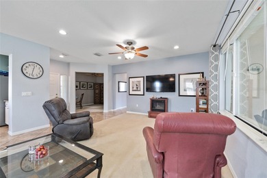 This beautifully maintained original-owner home features a 27' on Eagle Ridge At Spruce Creek Country Club in Florida - for sale on GolfHomes.com, golf home, golf lot