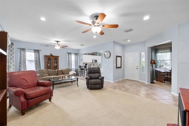 This beautifully maintained original-owner home features a 27' on Eagle Ridge At Spruce Creek Country Club in Florida - for sale on GolfHomes.com, golf home, golf lot
