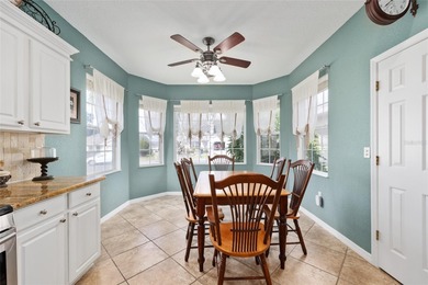 This beautifully maintained original-owner home features a 27' on Eagle Ridge At Spruce Creek Country Club in Florida - for sale on GolfHomes.com, golf home, golf lot