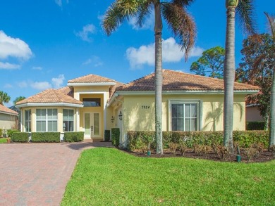 This pool home features a 2022 roof, laminate flooring on The Legacy Golf and Tennis Club in Florida - for sale on GolfHomes.com, golf home, golf lot