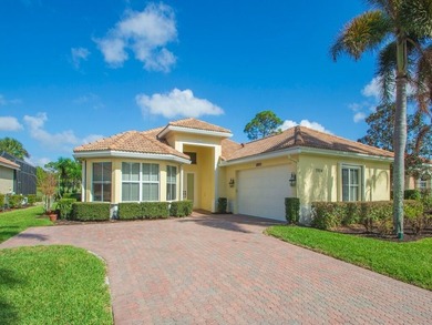 This pool home features a 2022 roof, laminate flooring on The Legacy Golf and Tennis Club in Florida - for sale on GolfHomes.com, golf home, golf lot