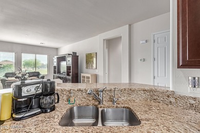 Overlooking the 4th hole of Copper Canyon Golf Resort, This on Copper Canyon Golf Club in Arizona - for sale on GolfHomes.com, golf home, golf lot