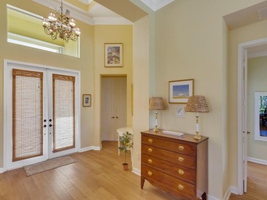 This pool home features a 2022 roof, laminate flooring on The Legacy Golf and Tennis Club in Florida - for sale on GolfHomes.com, golf home, golf lot