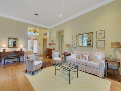 This pool home features a 2022 roof, laminate flooring on The Legacy Golf and Tennis Club in Florida - for sale on GolfHomes.com, golf home, golf lot