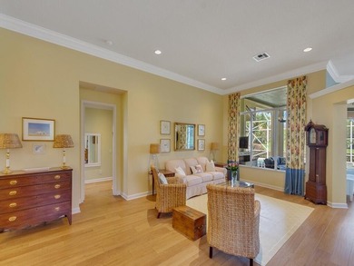 This pool home features a 2022 roof, laminate flooring on The Legacy Golf and Tennis Club in Florida - for sale on GolfHomes.com, golf home, golf lot