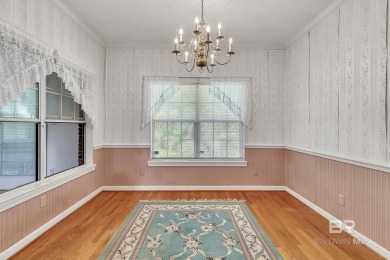 Charming Hilltop Home with Investment Potential in Sought-After on Lake Forest Yacht and Country Club in Alabama - for sale on GolfHomes.com, golf home, golf lot