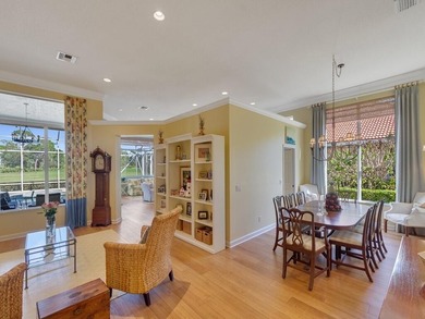 This pool home features a 2022 roof, laminate flooring on The Legacy Golf and Tennis Club in Florida - for sale on GolfHomes.com, golf home, golf lot