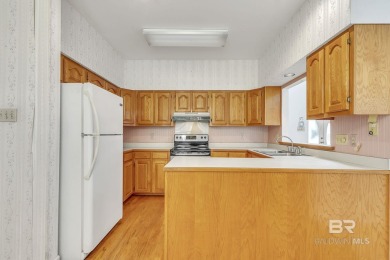 Charming Hilltop Home with Investment Potential in Sought-After on Lake Forest Yacht and Country Club in Alabama - for sale on GolfHomes.com, golf home, golf lot