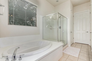 Overlooking the 4th hole of Copper Canyon Golf Resort, This on Copper Canyon Golf Club in Arizona - for sale on GolfHomes.com, golf home, golf lot