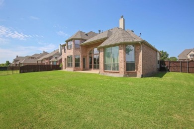 Gorgeous Drees custom home! Great curb appeal & amazing golf on Coyote Ridge Golf Club in Texas - for sale on GolfHomes.com, golf home, golf lot