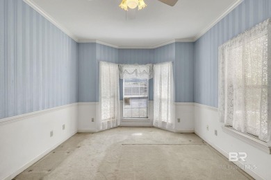 Charming Hilltop Home with Investment Potential in Sought-After on Lake Forest Yacht and Country Club in Alabama - for sale on GolfHomes.com, golf home, golf lot