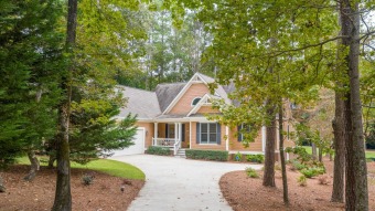 Enjoy the ease of a basically one-floor home on the Harbor Club on Harbor Club Golf and Country Club in Georgia - for sale on GolfHomes.com, golf home, golf lot