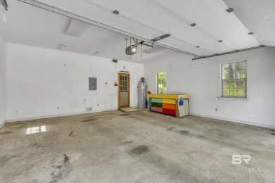 Charming Hilltop Home with Investment Potential in Sought-After on Lake Forest Yacht and Country Club in Alabama - for sale on GolfHomes.com, golf home, golf lot
