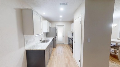 Welcome to this move-in-ready home in one of the most on Tiger Point Golf and Country Club in Florida - for sale on GolfHomes.com, golf home, golf lot