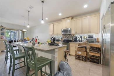 Welcome to this stunning 5-bedroom, 4-bath home with a 2-car on Harmony Golf Preserve in Florida - for sale on GolfHomes.com, golf home, golf lot