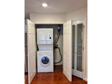 This spacious 2 bedroom, 2 bath condo with an open-concept on Royal Oaks Country Club in Texas - for sale on GolfHomes.com, golf home, golf lot