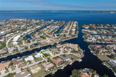 WATERFRONT HOME IN PGI W/**NEW TILE ROOF** & NEARLY INSTANT on Saint Andrews South Golf Club in Florida - for sale on GolfHomes.com, golf home, golf lot