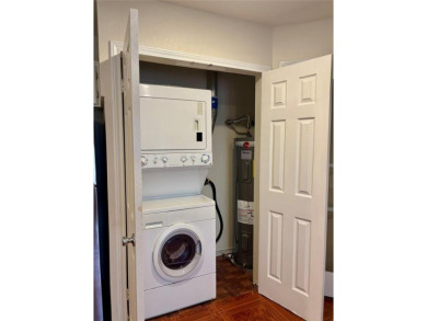 This spacious 2 bedroom, 2 bath condo with an open-concept on Royal Oaks Country Club in Texas - for sale on GolfHomes.com, golf home, golf lot