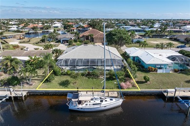 WATERFRONT HOME IN PGI W/**NEW TILE ROOF** & NEARLY INSTANT on Saint Andrews South Golf Club in Florida - for sale on GolfHomes.com, golf home, golf lot