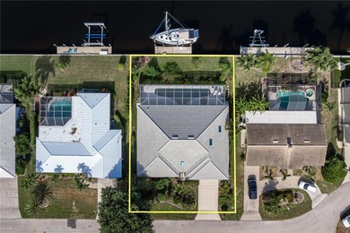 WATERFRONT HOME IN PGI W/**NEW TILE ROOF** & NEARLY INSTANT on Saint Andrews South Golf Club in Florida - for sale on GolfHomes.com, golf home, golf lot