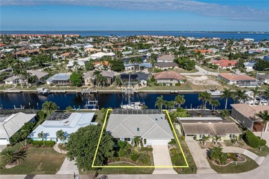 WATERFRONT HOME IN PGI W/**NEW TILE ROOF** & NEARLY INSTANT on Saint Andrews South Golf Club in Florida - for sale on GolfHomes.com, golf home, golf lot