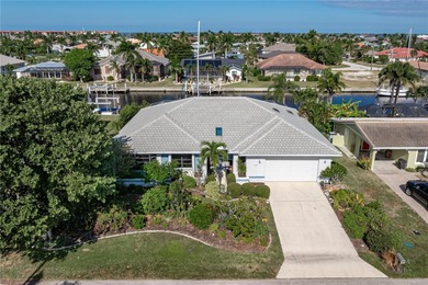WATERFRONT HOME IN PGI W/**NEW TILE ROOF** & NEARLY INSTANT on Saint Andrews South Golf Club in Florida - for sale on GolfHomes.com, golf home, golf lot
