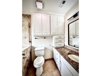 This spacious 2 bedroom, 2 bath condo with an open-concept on Royal Oaks Country Club in Texas - for sale on GolfHomes.com, golf home, golf lot