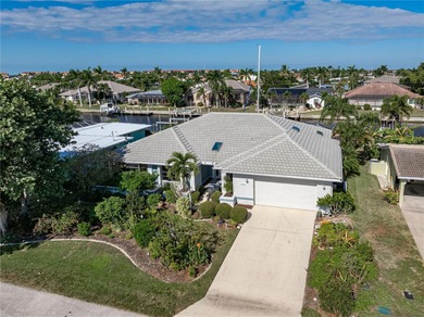 WATERFRONT HOME IN PGI W/**NEW TILE ROOF** & NEARLY INSTANT on Saint Andrews South Golf Club in Florida - for sale on GolfHomes.com, golf home, golf lot