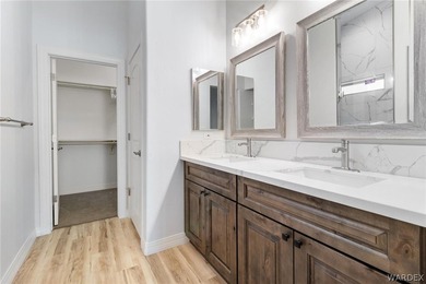 CUSTOM AND LIKE BRAND NEW! BUILT IN 2023, THIS 3 BEDROOM, 2 BATH on Desert Lakes Golf Course in Arizona - for sale on GolfHomes.com, golf home, golf lot