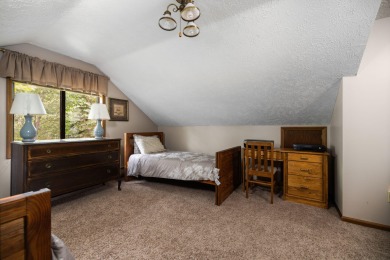 Welcome to this 3-bedroom, 2-bath home in the desirable Michaywe on Michaywe Pines Course in Michigan - for sale on GolfHomes.com, golf home, golf lot