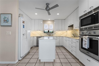 WATERFRONT HOME IN PGI W/**NEW TILE ROOF** & NEARLY INSTANT on Saint Andrews South Golf Club in Florida - for sale on GolfHomes.com, golf home, golf lot