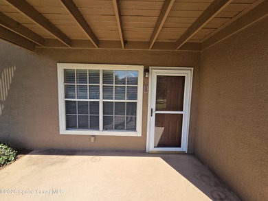 Easy living at The Greens at Viera East. This 1st floor condo on Viera East Golf Club in Florida - for sale on GolfHomes.com, golf home, golf lot