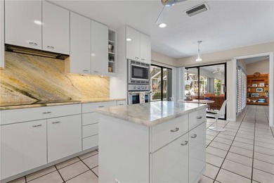 WATERFRONT HOME IN PGI W/**NEW TILE ROOF** & NEARLY INSTANT on Saint Andrews South Golf Club in Florida - for sale on GolfHomes.com, golf home, golf lot